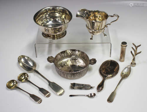 A collection of silver items, including a helmet cream jug, ...