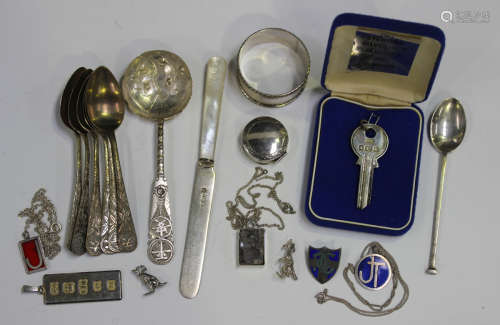 A small group of silver items, including a key, London 1978,...