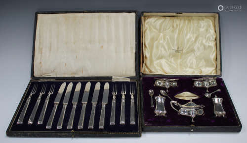 A George V silver part condiment set, comprising pair of pep...