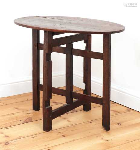 An oak folding occasional table