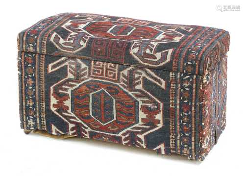 A kilim ottoman,