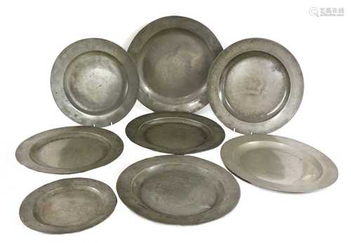 Eight pewter plates,