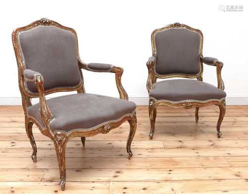 A similar pair of Louis XV-style gilt-framed armchairs,