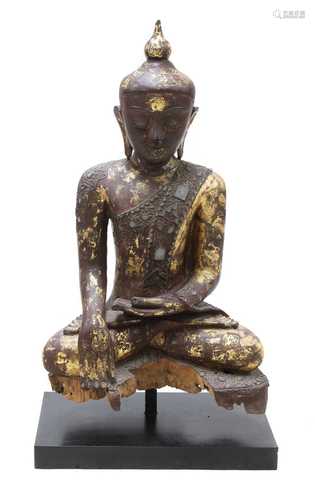 A wooden and lacquered Shakyamuni Buddha,