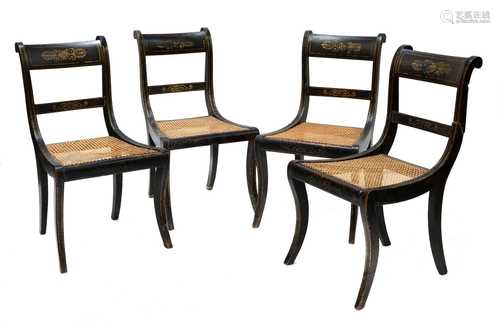 A set of four Regency black japanned dining chairs,