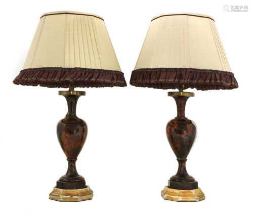 A pair of polished hardstone table lamps,
