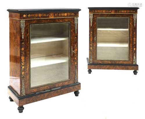 A pair of Victorian figured walnut pier cabinets,