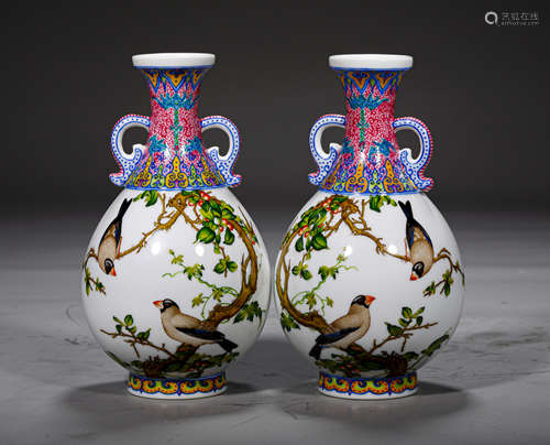 A PAIR OF QING STYLE FLOWER-AND-BIRD DESIGN PORCELAIN VASES