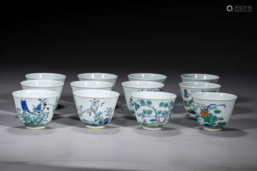 A SET OF 12 DOU CAI GLAZE PORCELAIN CUPS