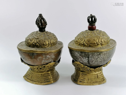 A pair of Tibetan Buddhist Bronze kapala offering bowl