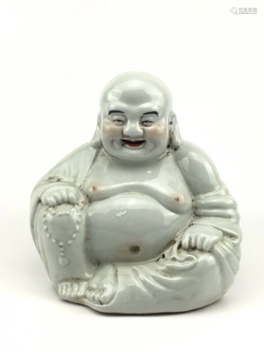 A White-glazed porcelain buddha statue