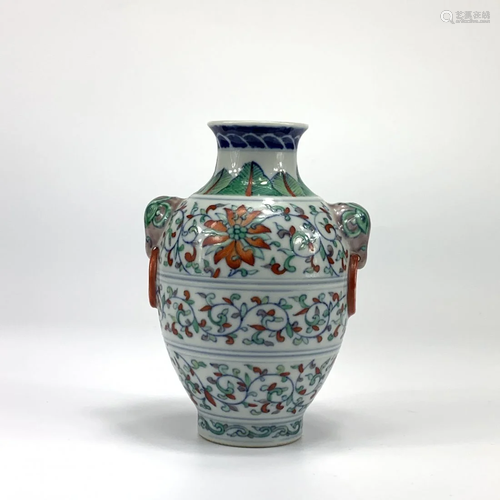 A DOUCAI ENAMELED PORCELAIN VASE