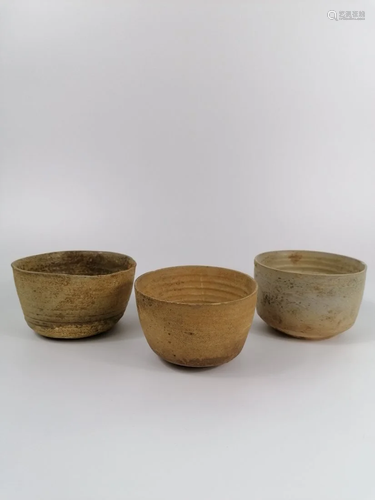 Three pottery bowls