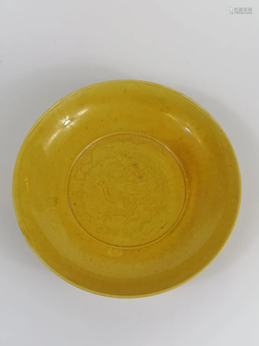 AN INCISED YELLOW-GLAZED 'DRAGON' DISH