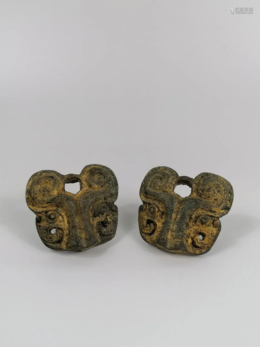 A pair of gilt Taotie Mask