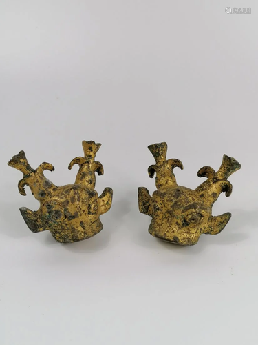 A pair of gilt deer head masks