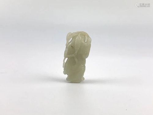 A white jade carving of LIUHAI