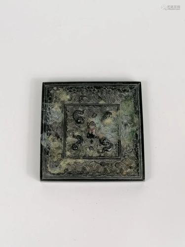 A Small Bronze Square Lion and Grapevine Mirror