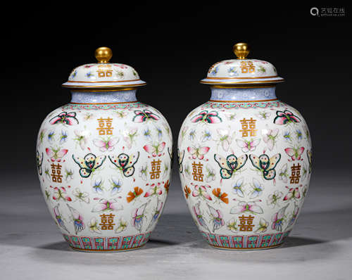 A PAIR OF QING STYLE PORCELAIN LIDDED JARS