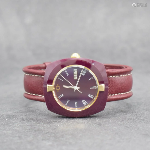 VACUUM wristwatch in ruby-case, Switzerland around 1980