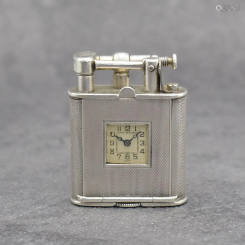 900/000 silver petrol lighter with inset watch