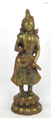 ASIE DU SUD EST : Divinité en bronze doré. Haut.: 34 cm.