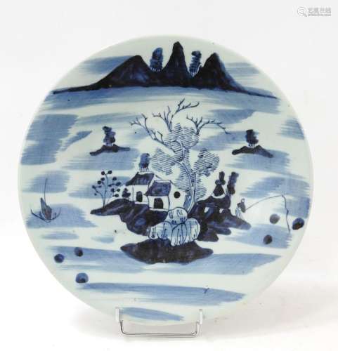 CHINE : Plat en porcelaine à décor blanc bleu d'un pêcheur d...