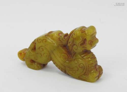 CHINE : Qiling en jadeite sculptée. 4 x 6 cm.