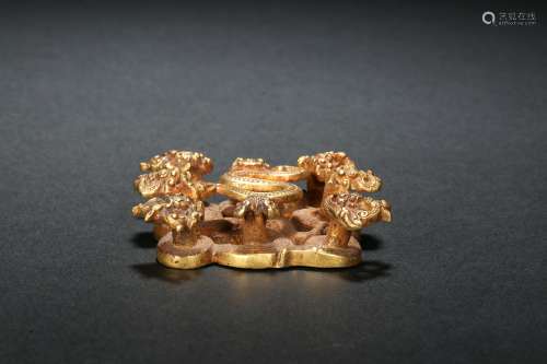 Gold inlaid buckle in Han Dynasty