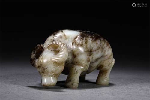 A HAN DYNASTY HETIAN JADE CATTLE