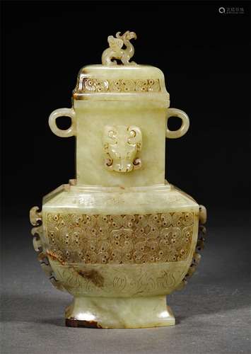 A WARRING STATES HETIAN JADE DRAGON GRAIN ORNAMENTAL BOTTLE