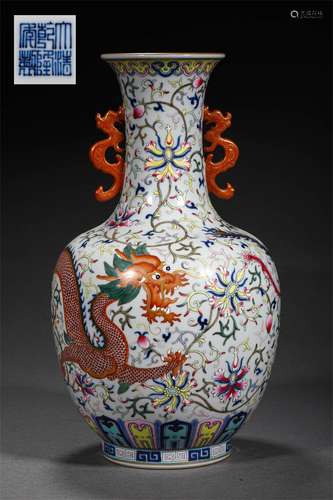 A QING DYNASTY QIANLONG FAMILLE ROSE DRAGON ORNAMENTAL BOTTL...