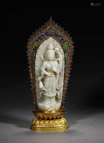 A QING DYNASTY HETIAN JADE KWAN-YIN STATUE