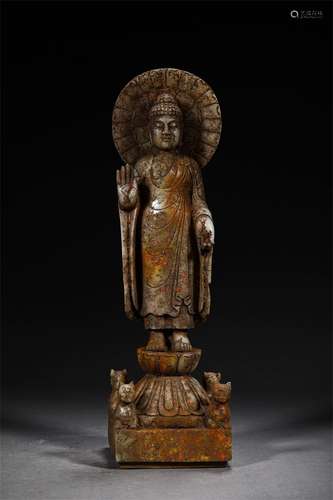 A MING DYNASTY JADE BUDDHA STATUE