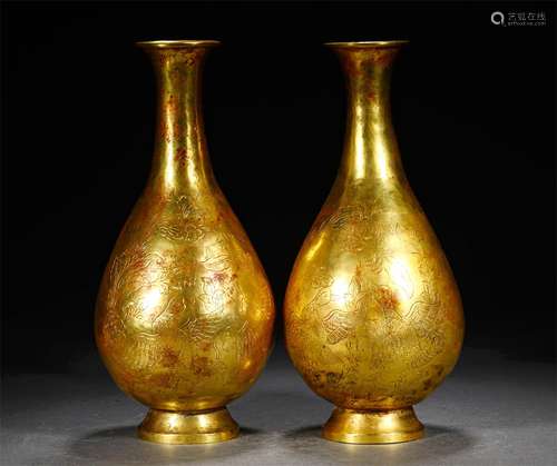 A PAIR OF LIAO DYNASTY BRONZE GILT FLOWER AND BIRD GRAIN JIN...