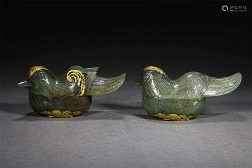 A PAIR OF LIAO DYNASTY HETIAN JADE QUAIL ORNAMENTS