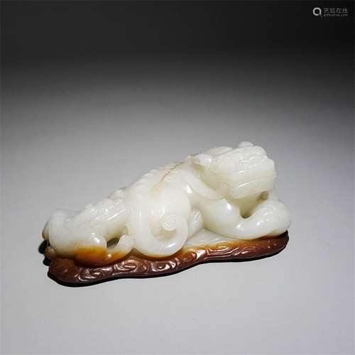 A QING DYNASTY HETIAN JADE MOTHER AND SON BEAST