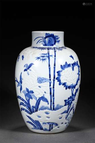 A QING DYNASTY BLUE AND WHITE FLOWER AND BIRD JAR