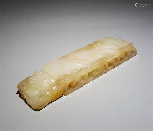 A QING DYNASTY HETIAN JADE CARVED FLOWER INK REST