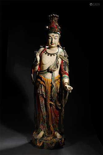 A MING DYNASTY WOOD COLORED DRWAING KWAN-YIN STATUE