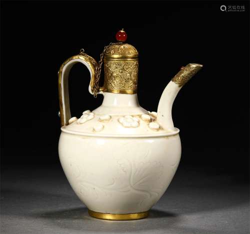 A LIAO DYNASTY DING KILN GILD EWER