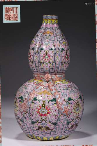 A QING DYNASTY FAMILLE ROSE INTERLOCKING LOTUS FLOWER GOURD ...