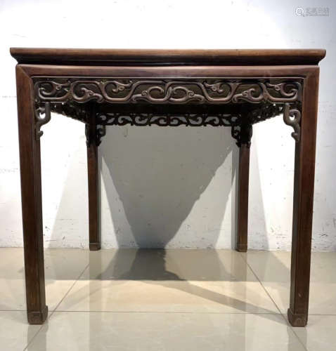 RED WOOD CARVED TABLE