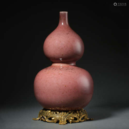 A RED-GLAZED GOURD VASE, QING DYNASTY, CHINA