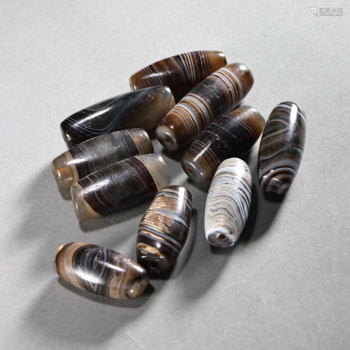 A GROUP OF AGATE BEADS, TANG DYNASTY, CHINA