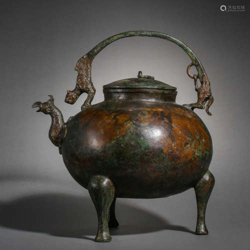 TANG DYNASTY, CHINESE BRONZE PHOENIX-HEAD MOUTH KETTLE