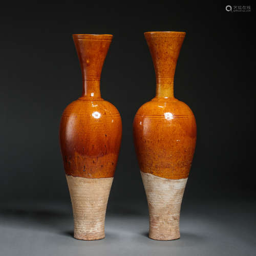 A PAIR OF YELLOW-GLAZED LONG-NECKED VASES, LIAO DYNASTY, CHI...