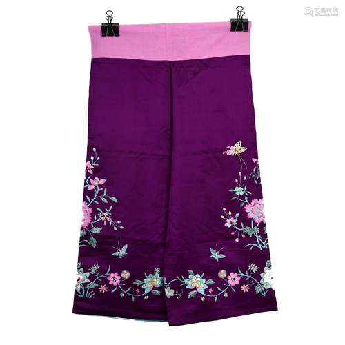 A PURPLE EMBROIDERED FLORAL SKIRT