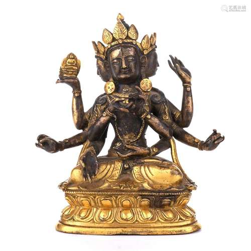 A GILT-BRONZE FIGURE OF EIGHT-ARMED BODHISATTVA