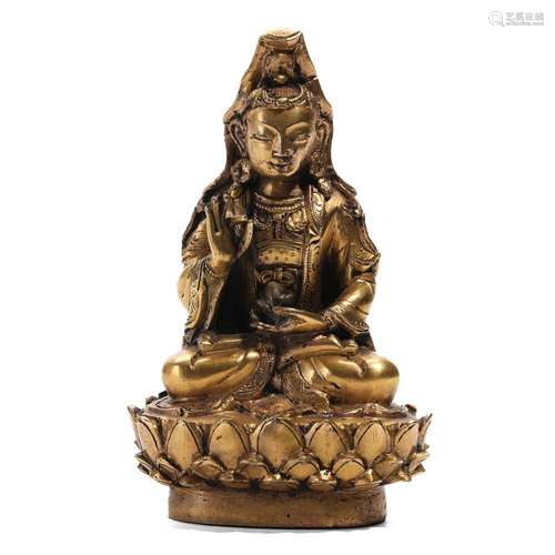 A GILT-BRONZE FIGURE OF SEATED GUANYIN